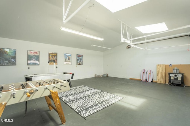 interior space with concrete floors and a skylight