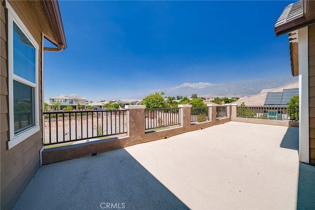 view of patio / terrace with a mountain view