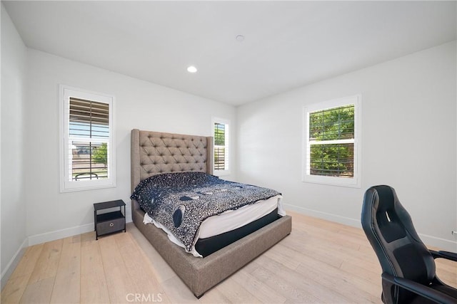 bedroom with light wood-type flooring