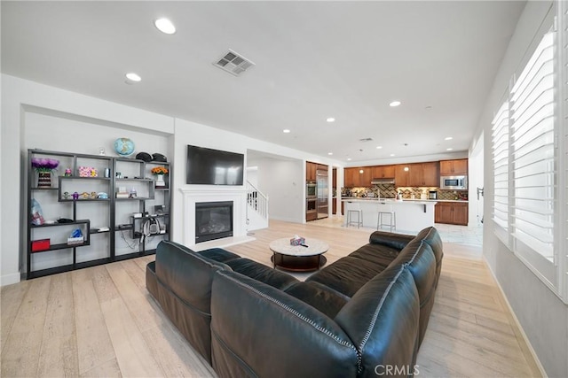 living room featuring light hardwood / wood-style floors