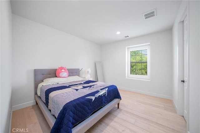 bedroom featuring light hardwood / wood-style flooring