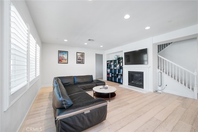 living room featuring light wood-type flooring