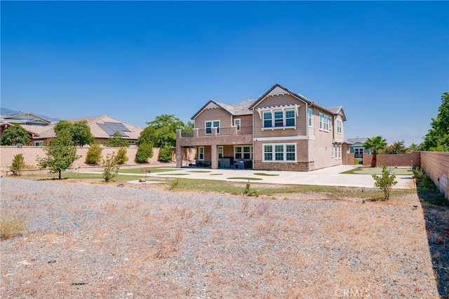 view of front of property with a patio