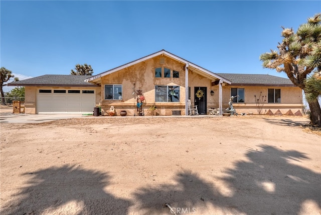 single story home with a garage