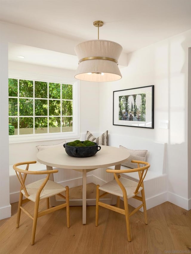 dining area featuring hardwood / wood-style floors and breakfast area