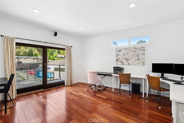 office space featuring hardwood / wood-style flooring and plenty of natural light