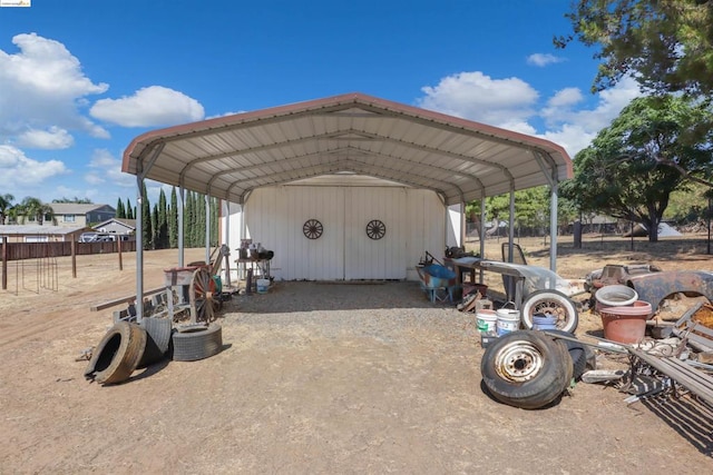 view of parking / parking lot with a carport