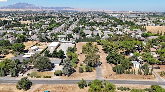 bird's eye view with a mountain view