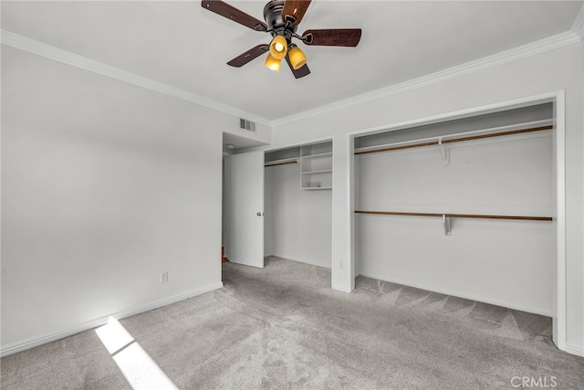 unfurnished bedroom featuring ceiling fan, light colored carpet, and ornamental molding