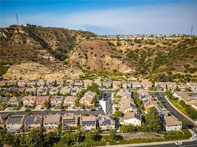 birds eye view of property featuring a residential view and a mountain view