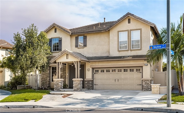 view of front of property featuring a garage