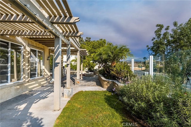 view of yard with a patio and a pergola