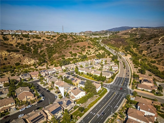 bird's eye view featuring a mountain view and a residential view