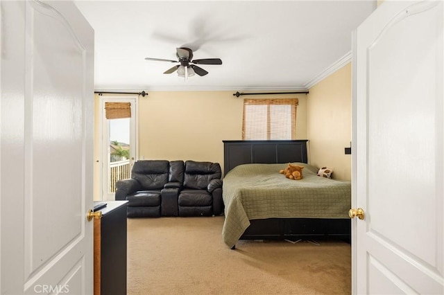 bedroom with light colored carpet, ceiling fan, crown molding, and access to outside
