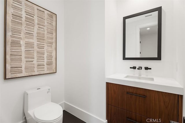 32531 Azores Rd, Dana Point, CA 92629 - bathroom with baseboards, vanity, and toilet