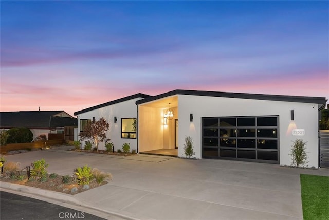 32531 Azores Rd, Dana Point, CA 92629 - view of front facade with driveway, a garage, and stucco siding