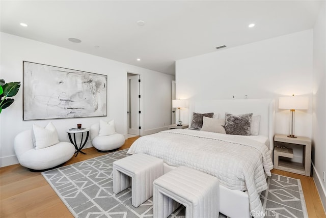 bedroom with light wood-type flooring