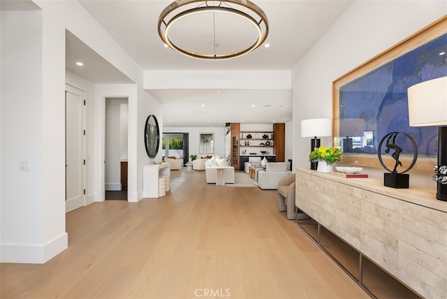 entryway with light hardwood / wood-style floors