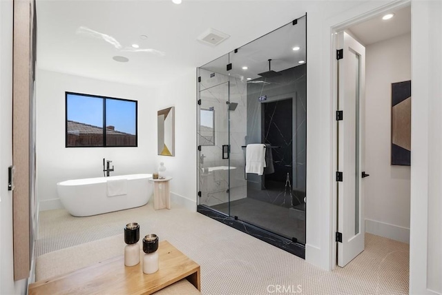 32531 Azores Rd, Dana Point, CA 92629 - bathroom with baseboards, a marble finish shower, a soaking tub, and recessed lighting