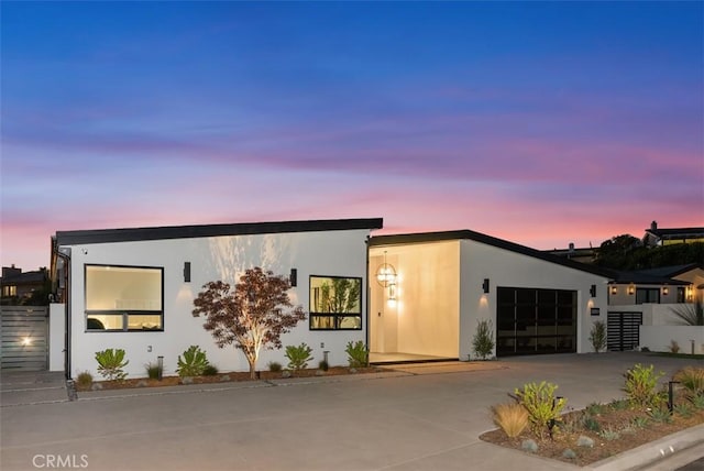 32531 Azores Rd, Dana Point, CA 92629 - view of front of property featuring a garage, concrete driveway, stucco siding, and fence