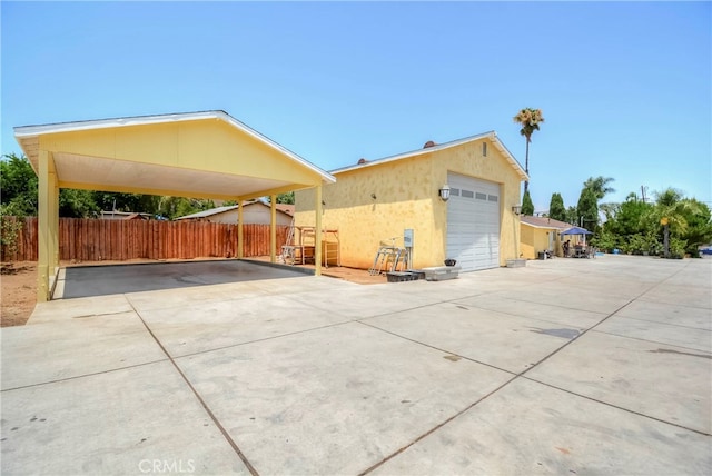 view of side of home with a garage