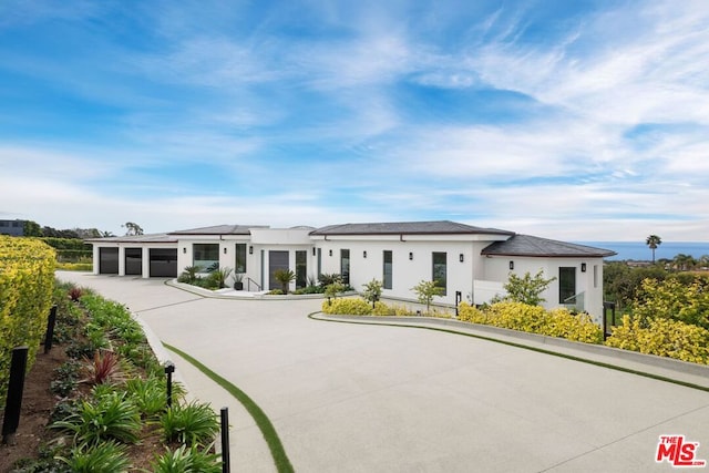 view of front of property with a garage