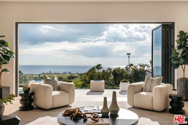 living room featuring a water view