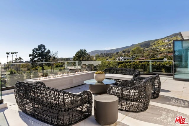 view of patio with a mountain view