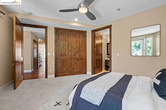 bedroom with ceiling fan and carpet