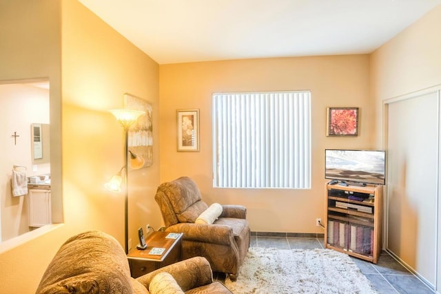 living area with light tile patterned floors