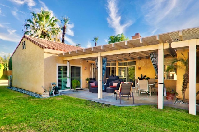 rear view of property with a lawn, a patio area, a pergola, and outdoor lounge area