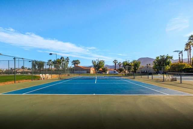 view of sport court featuring basketball court