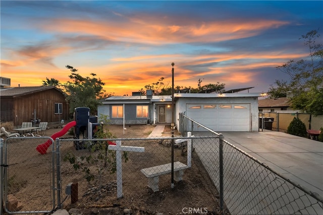 view of front of property featuring a garage