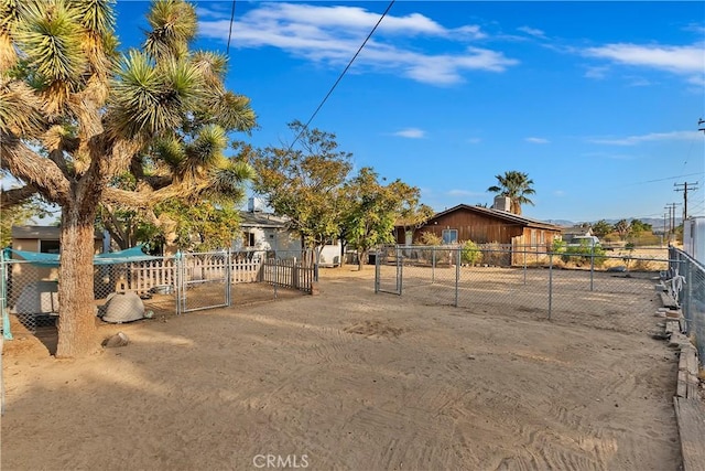 view of front facade with a gate and fence
