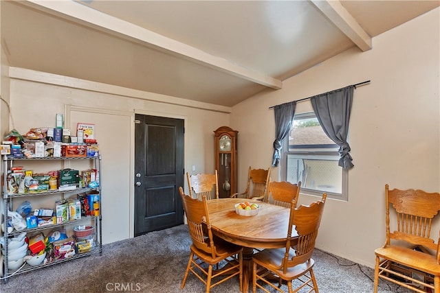 dining area with vaulted ceiling with beams and carpet flooring