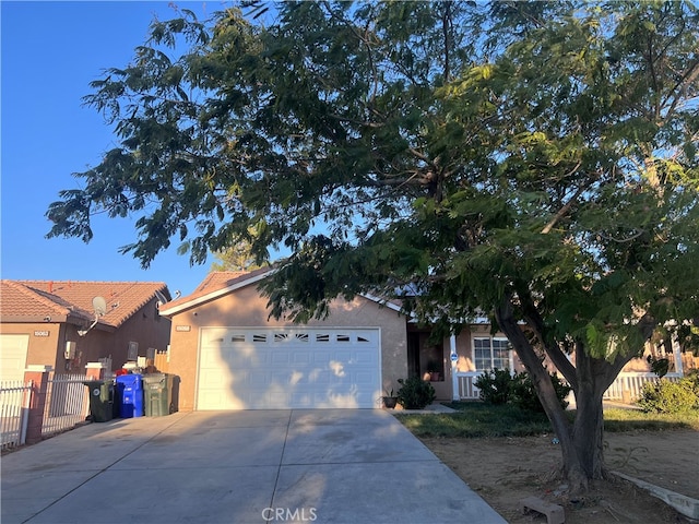 view of front of property with a garage