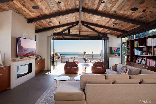 tiled living room featuring a wealth of natural light, lofted ceiling with beams, and wood ceiling