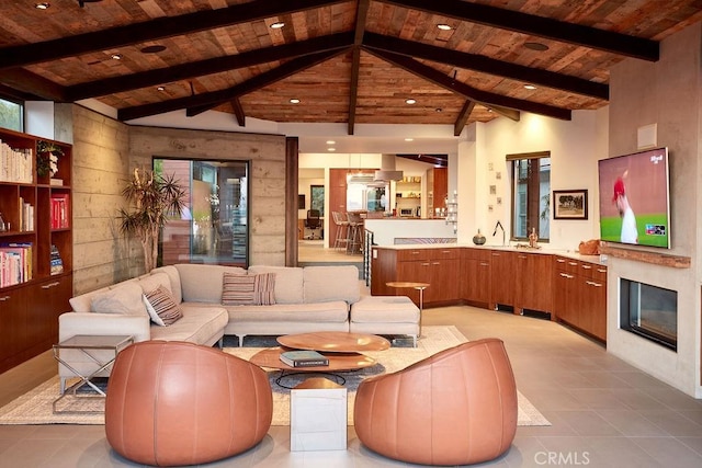 tiled living room featuring wood ceiling, high vaulted ceiling, and beamed ceiling