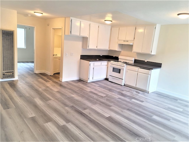 kitchen with white cabinetry, light hardwood / wood-style floors, white gas stove, and sink