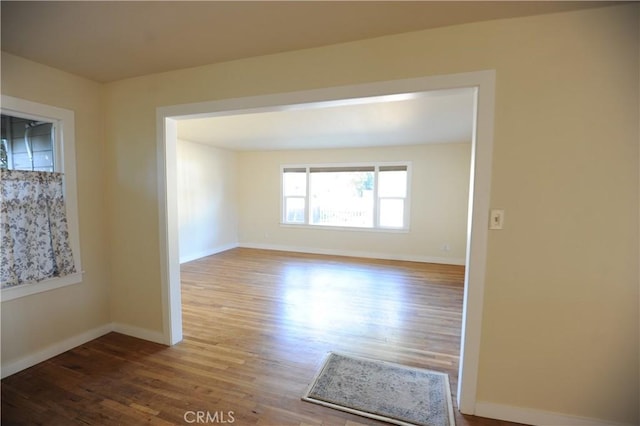 empty room featuring hardwood / wood-style floors