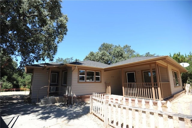 view of front of property featuring covered porch