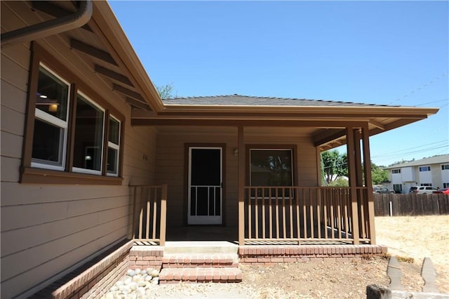 doorway to property with a porch