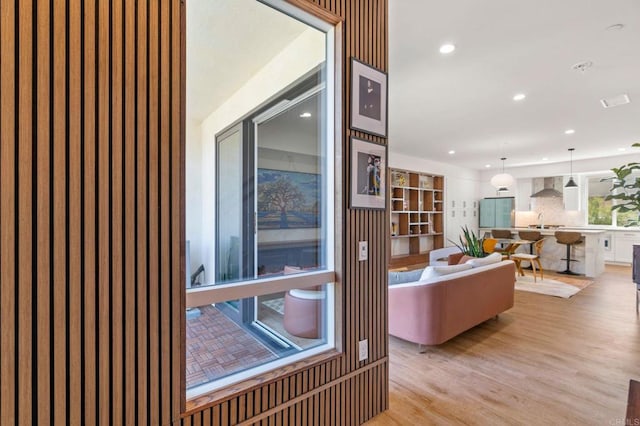 interior space featuring sink and light wood-type flooring