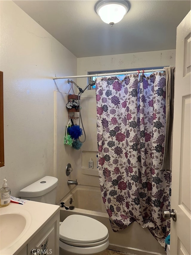 full bathroom featuring vanity, toilet, and shower / bath combo with shower curtain