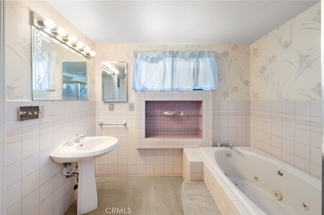 bathroom featuring tiled bath and tile walls