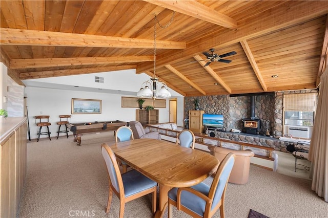 carpeted dining area featuring wooden ceiling, ceiling fan, a wood stove, vaulted ceiling with beams, and billiards