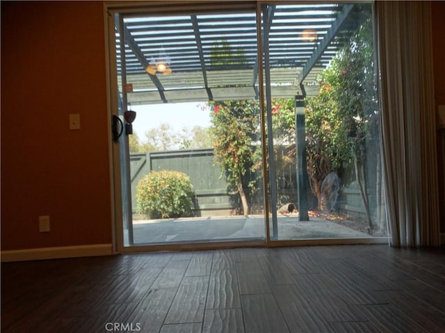 doorway to outside featuring hardwood / wood-style floors