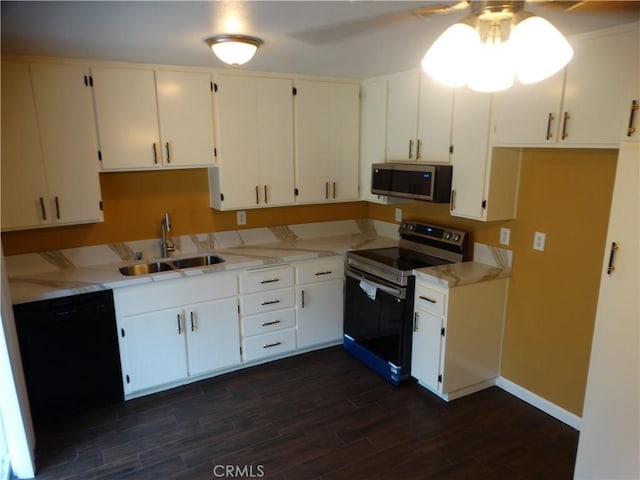 kitchen featuring white cabinets, range with electric stovetop, dishwasher, and sink