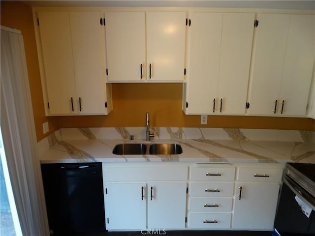 kitchen featuring white cabinets, sink, light stone countertops, and black dishwasher