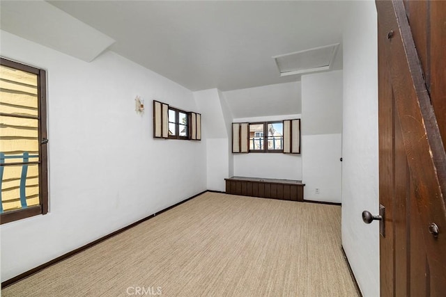 115 Apolena Ave, Newport Beach, CA 92662 - spare room featuring carpet floors and attic access
